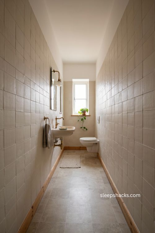 Corner sink ideas for a narrow toilet room with more floor space 