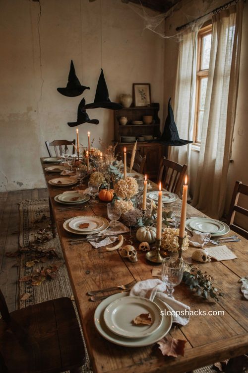 Cottagecore candlelit Halloween dining room with floating witch hats vintage plates and dried flowers