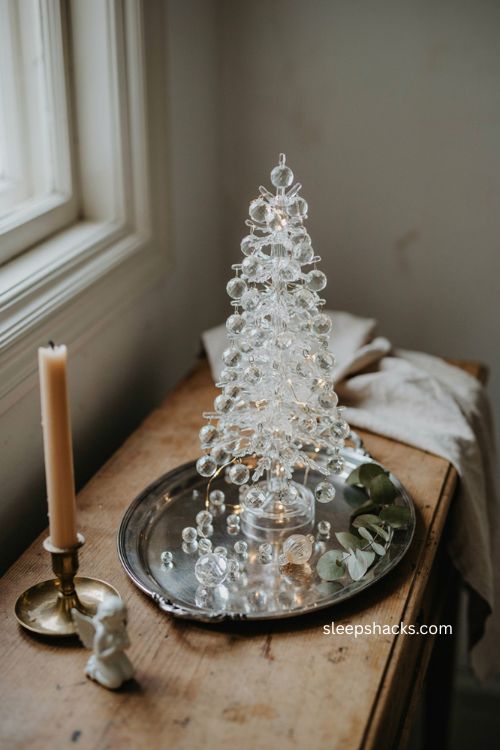 Crystal Christmas tree on mirrored tray with sparkling reflections
