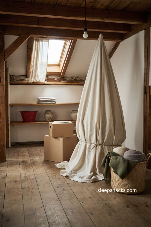 DIY Christmas tree storage hacks with an old sheet cover for dust free holiday storage 