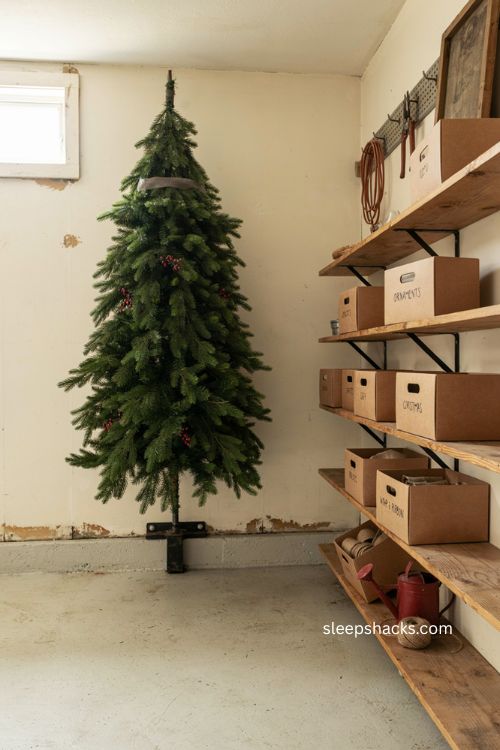 DIY Christmas tree wall storage with vertical mounts for space saving garage organization 