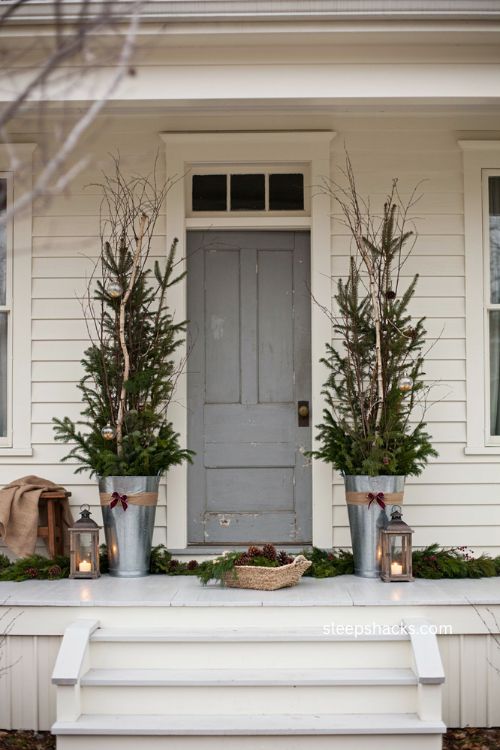 DIY galvanized bucket topiary for rustic Christmas porch decor 