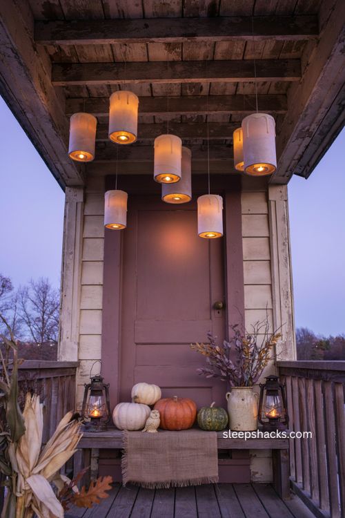 Diy floating candles made from toilet paper rolls for cozy Halloween porch decor 