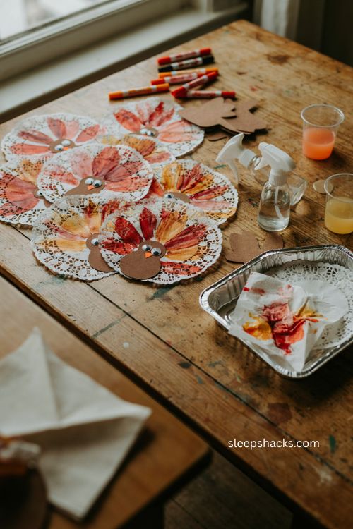 Doily turkey watercolor craft for toddlers with colorful fall patterns 