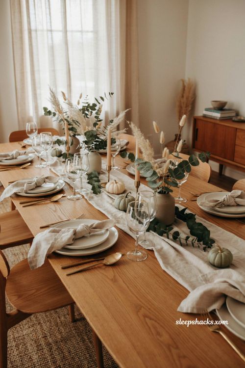 Dried and fresh greenery Thanksgiving centerpiece with eucalyptus lagurus grass and neutral table decor
