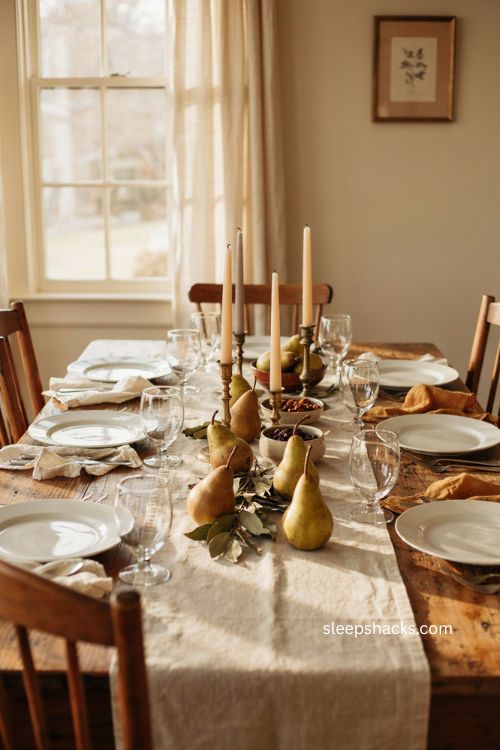 Easy Thanksgiving table decor with grocery store pears candles and greenery