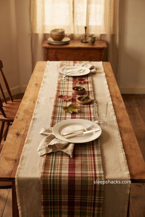 Easy Thanksgiving table decor with layered plaid table runner and neutral linen