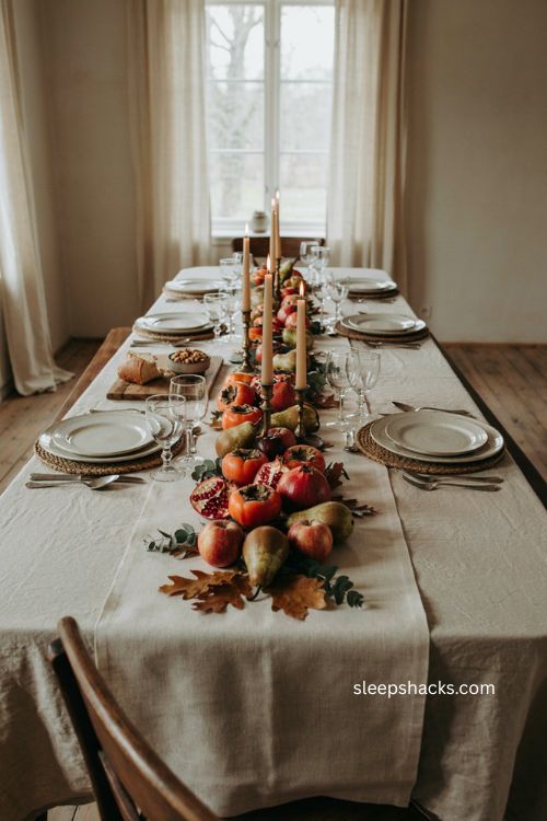 Elegant Thanksgiving table with seasonal fruit centerpiece 