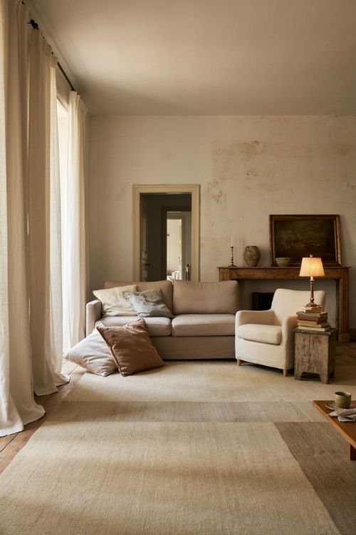 Elegant living room decor with vintage antique furniture and timeless collected style 