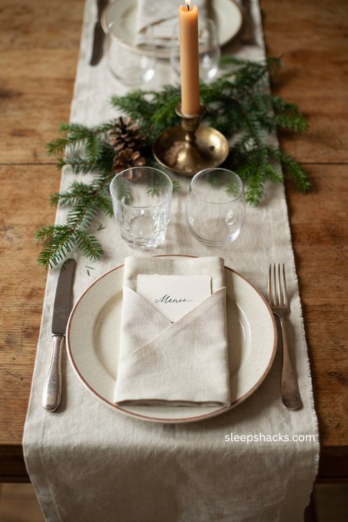 Envelope napkin folding idea with menu card for Christmas table 