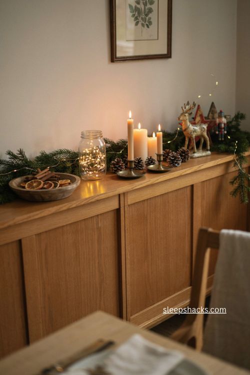 Fairy lights and LED candles Christmas sideboard decor with warm cozy glow