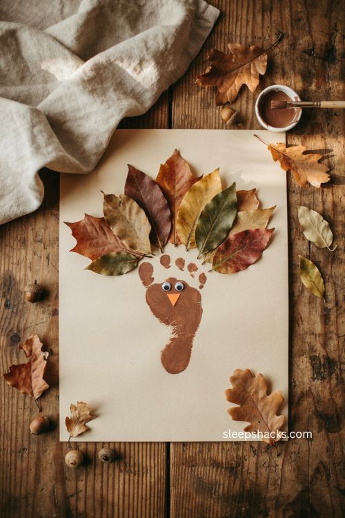 Fall leaf footprint turkey craft with real autumn leaves for Thanksgiving 