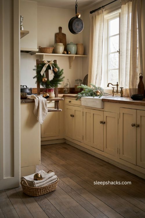 Farmhouse Christmas kitchen with vintage bells repeated throughout the decor