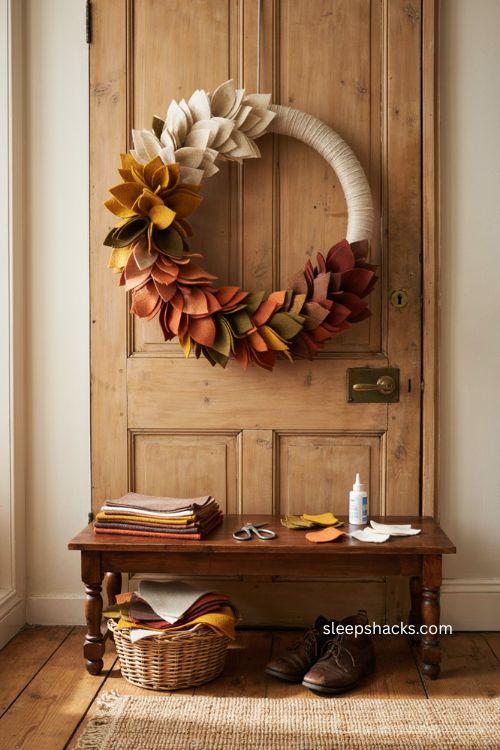 Felt leaf wreath Thanksgiving door decor with layered autumn colors and plush handmade texture 