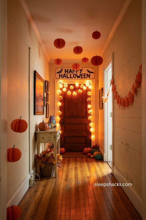 Festive Halloween hallway with pumpkin string lights paper pumpkins and cheerful decor 