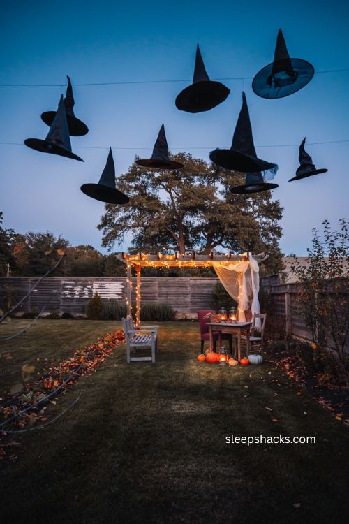 Floating witch hat display for backyard Halloween party decorations 