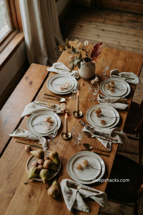 Foraged branches with seed pods for Thanksgiving place settings 