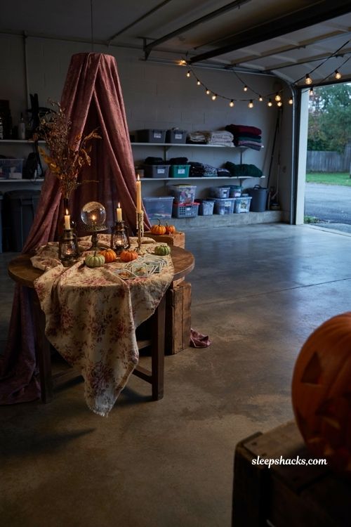 Garage Halloween party ideas with a moody fortune teller tent