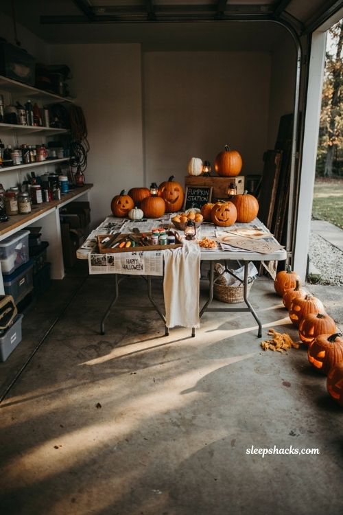 Garage Halloween party ideas with cozy pumpkin carving station