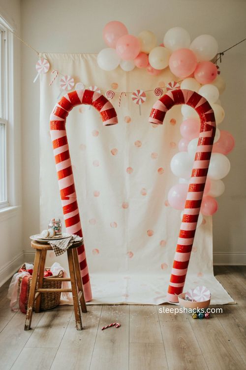 Giant candy cane photo booth frame for a diy candy party 