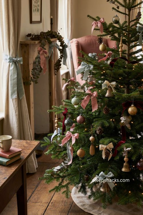 Gingham bow Christmas tree ornaments in a cozy traditional holiday living room 