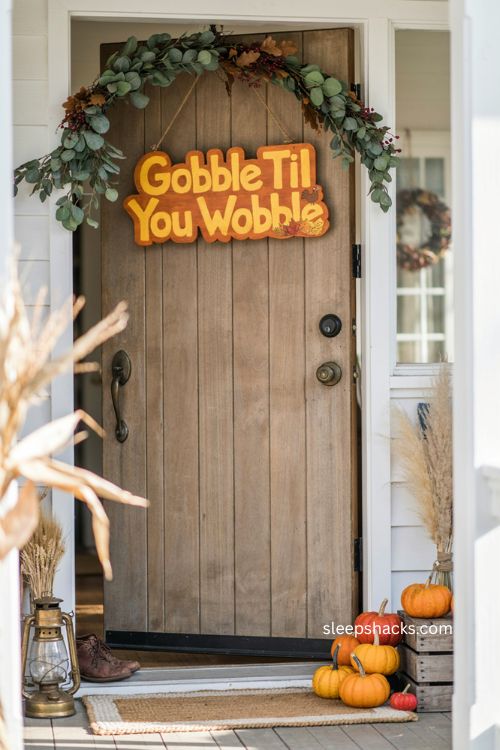 Gobble Til You Wobble Thanksgiving door sign with playful farmhouse porch decor 