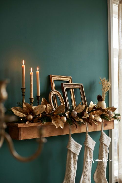 Gold garland on dark green walls Christmas decor ideas