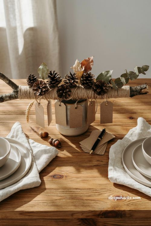 Gratitude stick centerpiece thanksgiving table decor with pinecones and thankful tags
