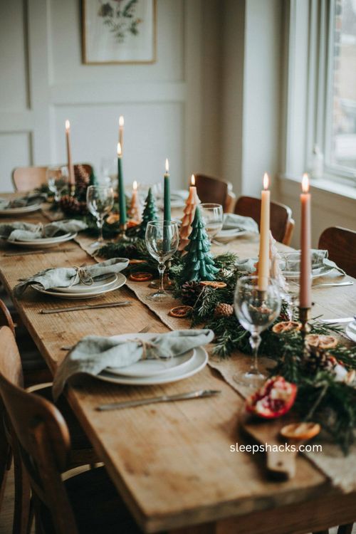 Green Christmas table with whimsical tree shaped taper candles and cedar garland 