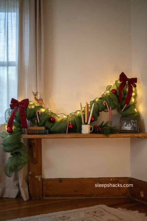 Green mesh grinch garland with red ornaments candy canes and oversized bows