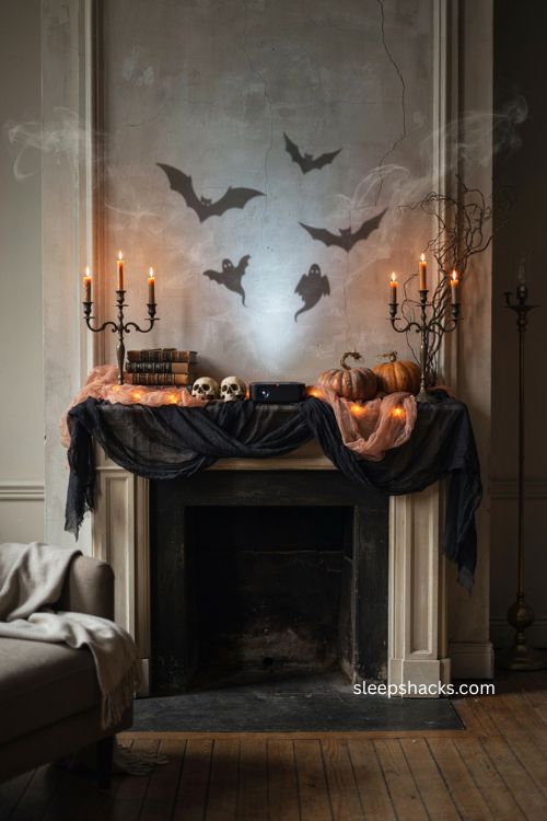 Halloween fireplace mantel with tabletop projector bats ghosts fog and orange lights