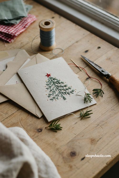 Hand embroidered thread Christmas card ideas with simple stitched designs
