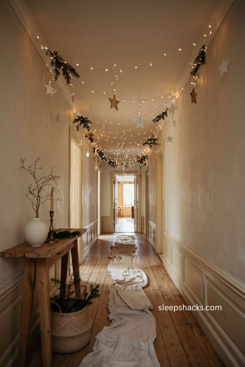 Hanging Christmas stars with hallway ceiling lights 