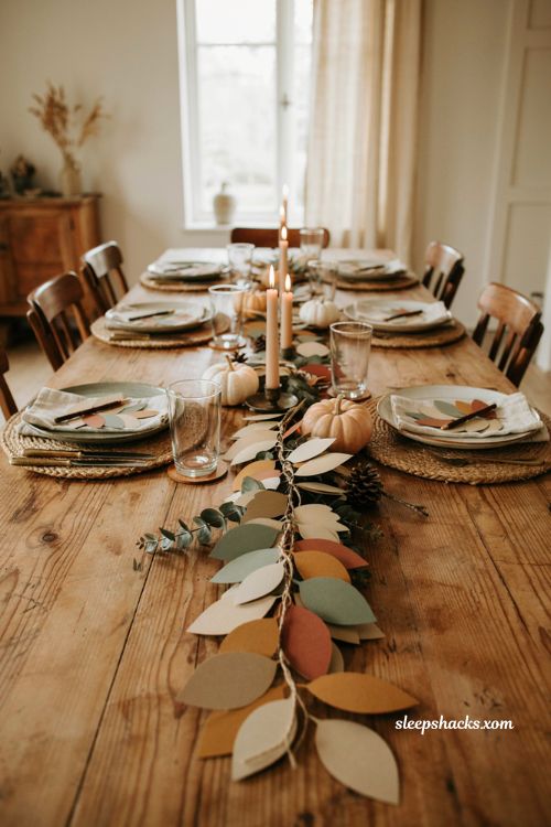 Interactive Thanksgiving tablescape with gratitude leaf garland and rustic decor