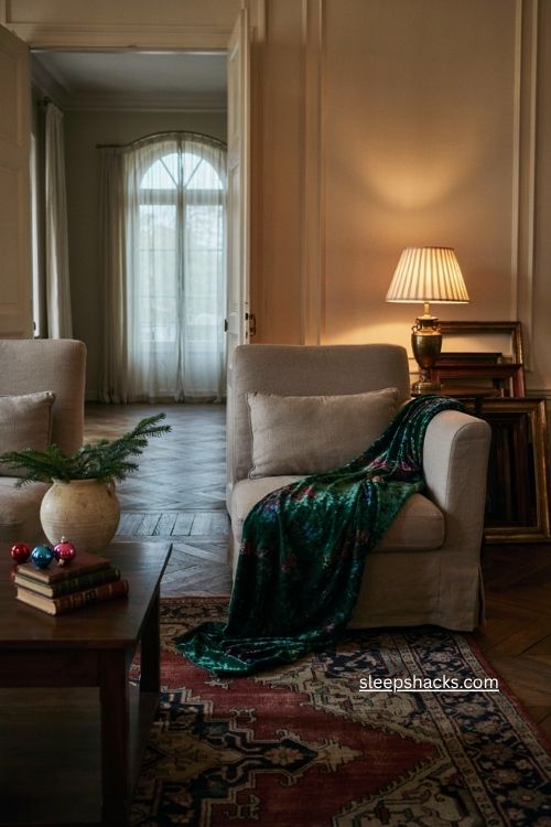Jewel tone velvet Christmas throw with gold accents in elegant living room 