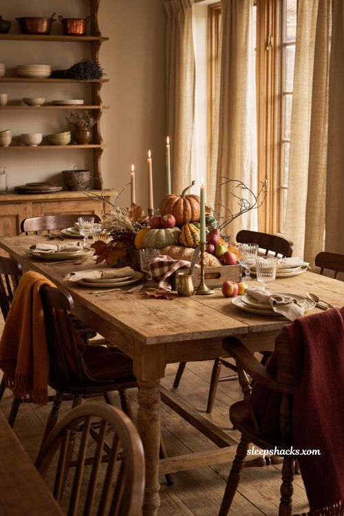 Layered Suzani Thanksgiving table with gold accents and eclectic decor 