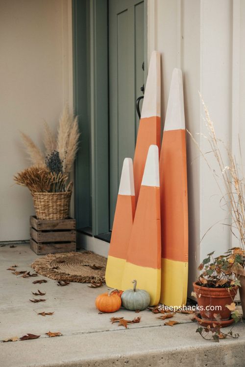 Life size candy corn cutouts for a fall halloween display 