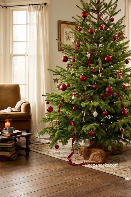 Lime green Grinch Christmas tree with red ornaments 