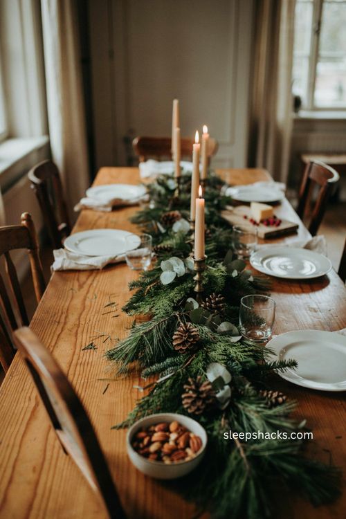 Lush layered Christmas garland table runner with cedar eucalyptus and pinecones 