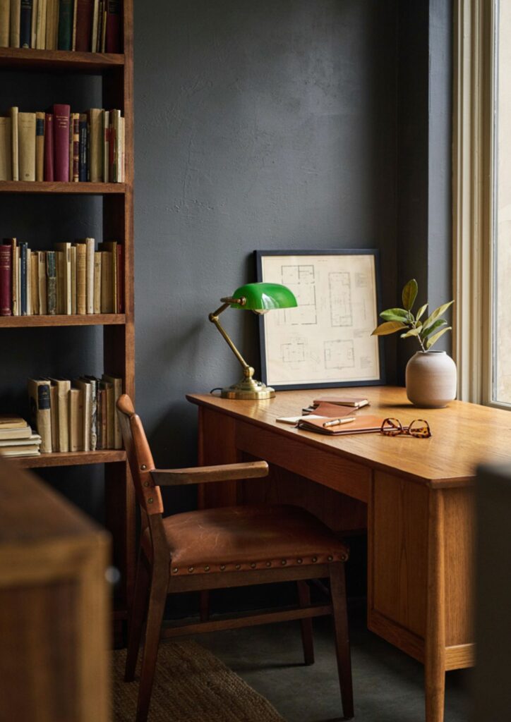 Mens office decor with dark walls rich wood leather and clean lines