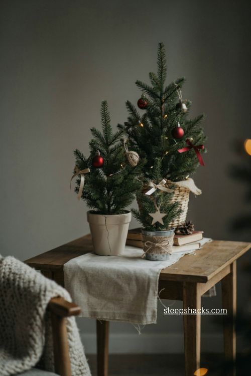 Miniature tree christmas end table decor with tiny ornaments baskets and fairy lights 