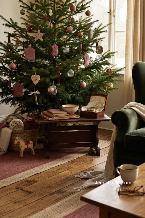 Mixed memory Christmas tree with handmade ornaments travel souvenirs and family keepsakes