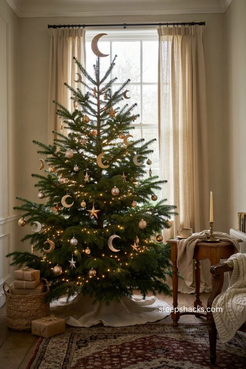 Moon and star Christmas tree with gold silver and champagne ornaments