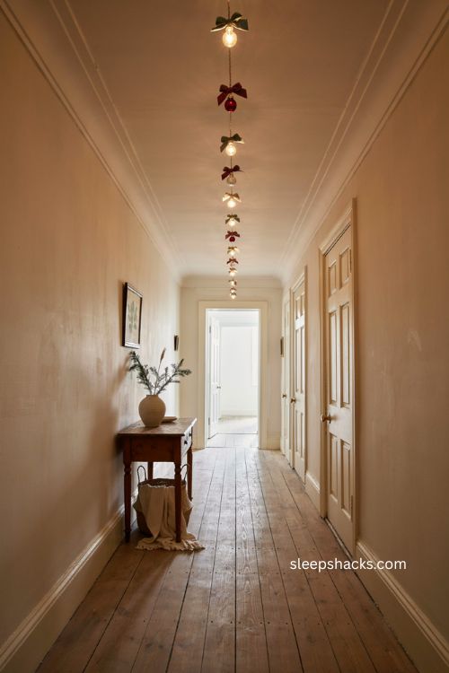 Narrow hallway with simple Christmas lights on ceiling 