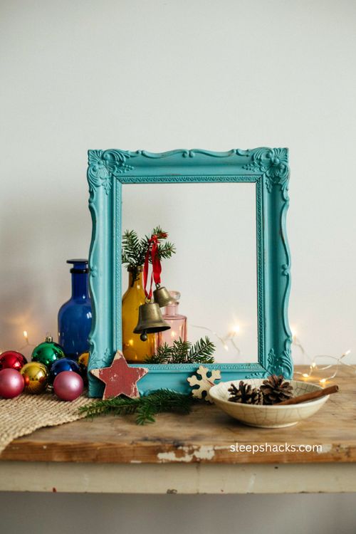 Painted turquoise vintage frame in colorful Christmas decor 