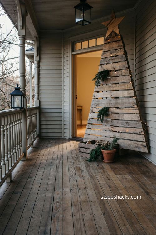 Pallet wood christmas tree in a rustic frame for farmhouse porch decor 
