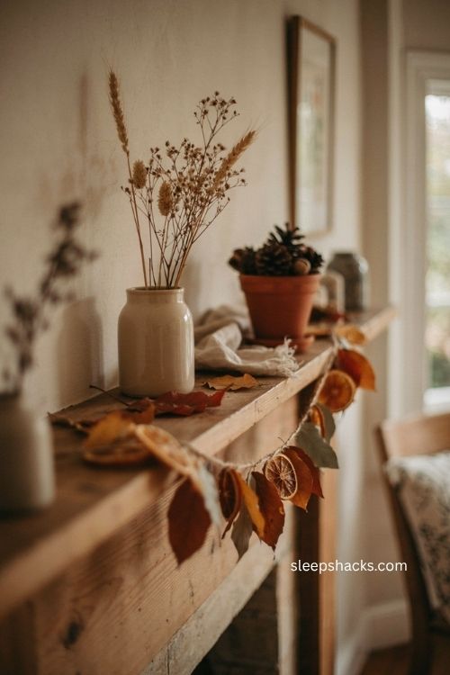 Paper leaf and dried citrus garland for cozy fall mantel decor 