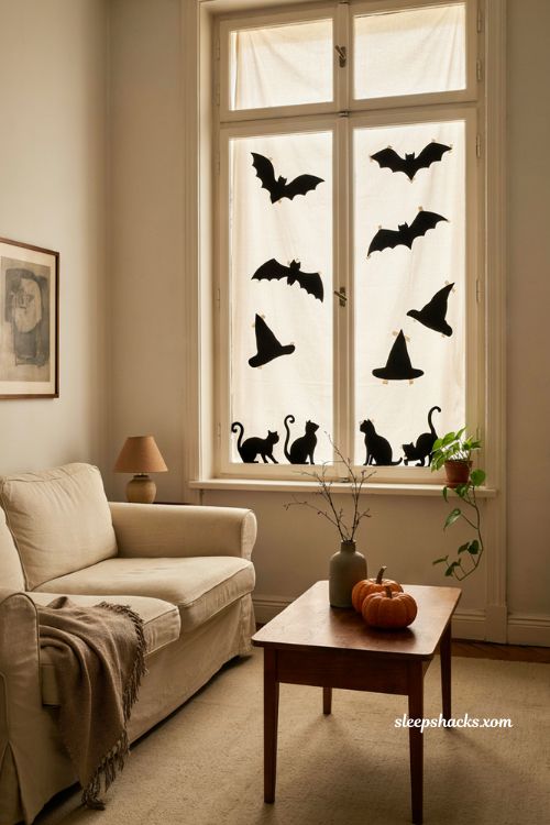 Paper silhouette window cutouts Halloween decorations for apartments 