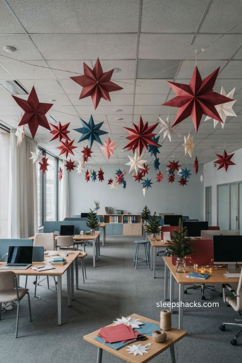Paper snowflake ceiling Christmas office decorating ideas with handmade winter decor 