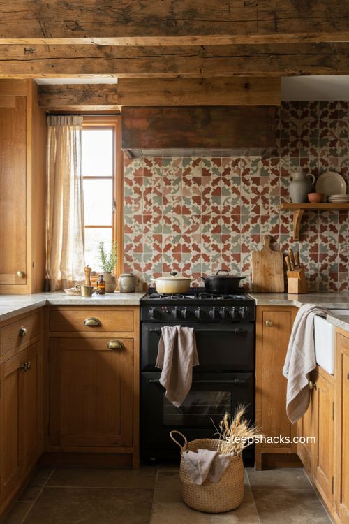 Patterned earthy tile backsplash behind the stove in a cozy rustic kitchen 